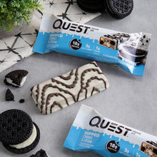 Load image into Gallery viewer, Quest Nutrition Cookies and Cream Protein Bar - artistic