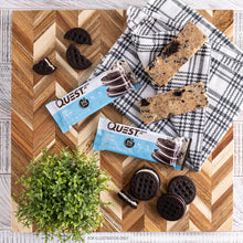 Load image into Gallery viewer, Quest Nutrition Cookies and Cream Protein Bar - artistic 2