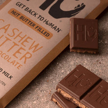 Load image into Gallery viewer, Hu Kitchen Milk Chocolate Cashew Butter bar 2.1 oz angle