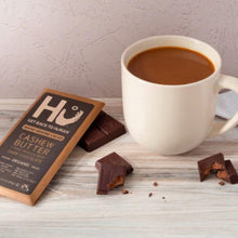 Load image into Gallery viewer, Hu Kitchen Paleo Dark Chocolate Cashew Butter and Pure Vanilla Bean bar with coffee or tea