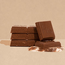 Load image into Gallery viewer, Hu Kitchen Simple Milk Chocolate bar 2.1 oz stack