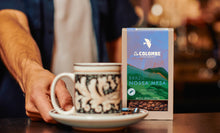 Load image into Gallery viewer, La Colombe Brazil Nossa Mesa 12 oz lifestyle 2
