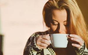 Caffe Vita - Theo Blend Organic Coffee - woman enjoys